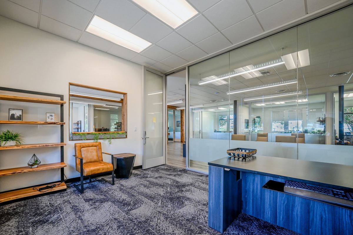 The Atrium suite: a wraparound interior window, shelving and a reading chair